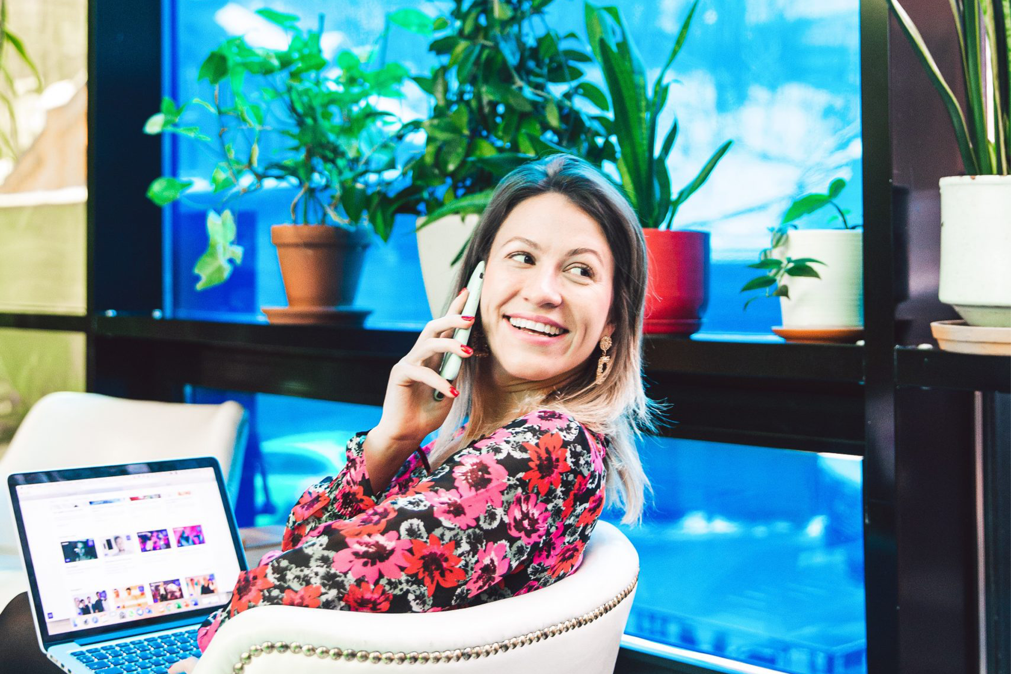 Woman working phone smiling