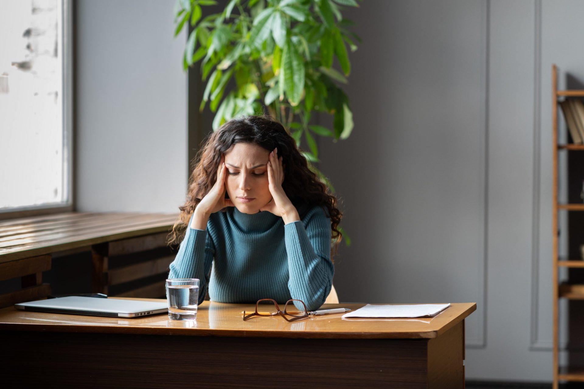 Stressed female thinking mental health problems workplace